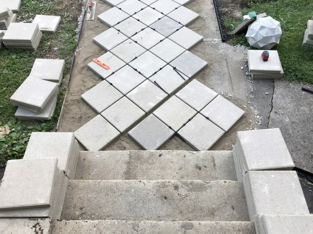 DIY How To Install Pavers Over Old Concrete Beginning in the Middle